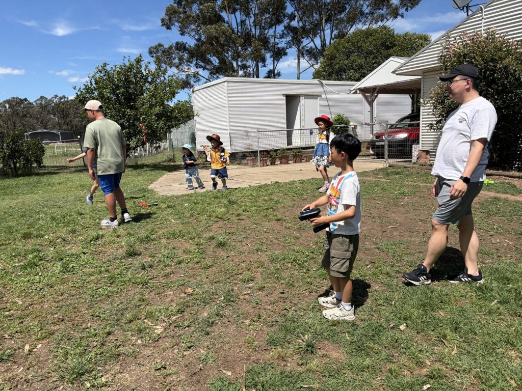ACJC members and families enjoying the farm